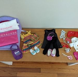 Lot American girl clothing, accessories, hotel bed